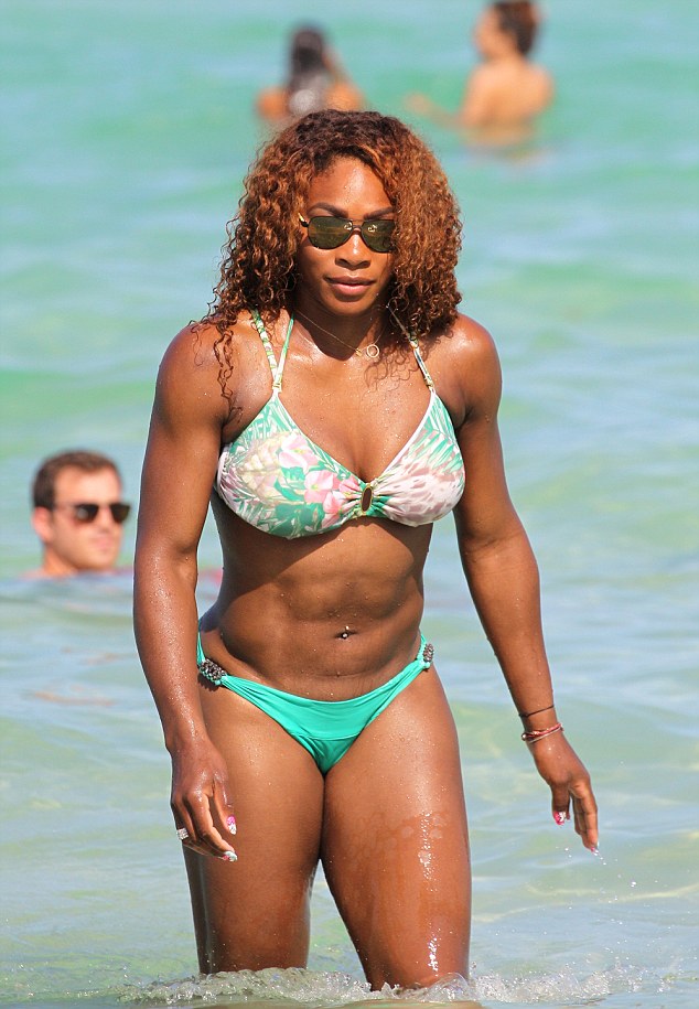 Serena Williams in a green floral print bikini at the beach in Miami